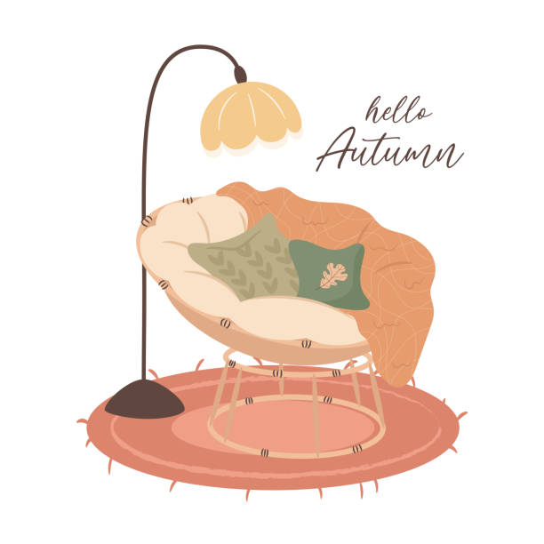 Hello Autumn. Rattan armchair with cushions and warm blanket. Cozy autumn days Hello Autumn. Rattan armchair with cushions and warm blanket. Cozy autumn days concept. knitted pumpkin stock illustrations