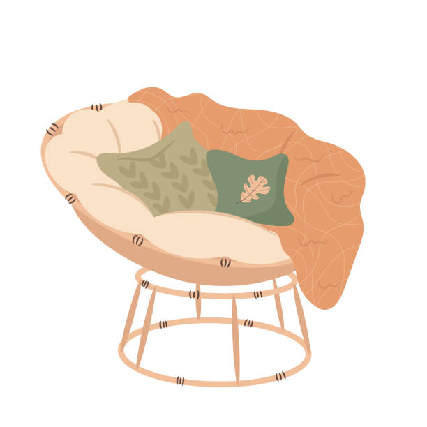 Cozy home rattan armchair with cushions and warm blanket. Cozy autumn days Cozy home rattan armchair with cushions and warm blanket. Cozy autumn days concept. knitted pumpkin stock illustrations