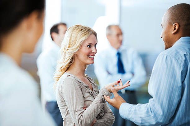 istock Group of successful businesspeople standing and talking. 170036844