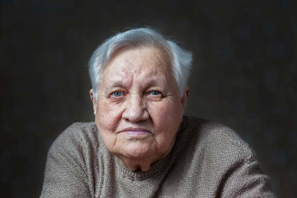 istock Elderly, smile woman in the studio 1700368670
