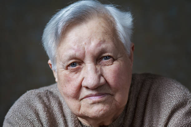 istock Elderly woman in the studio, close-up 1700369030
