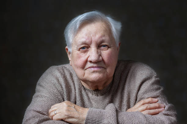 istock Elderly, smile woman in the studio 1700369197