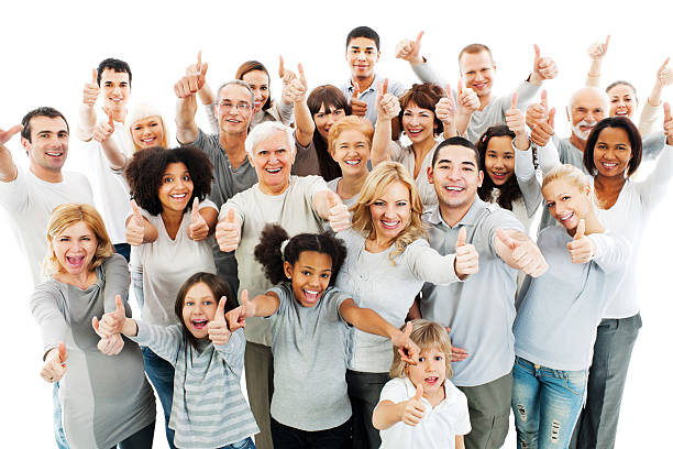 large group of people には、親指を立てる。 - thumbs up child success winning ストックフォトと画像