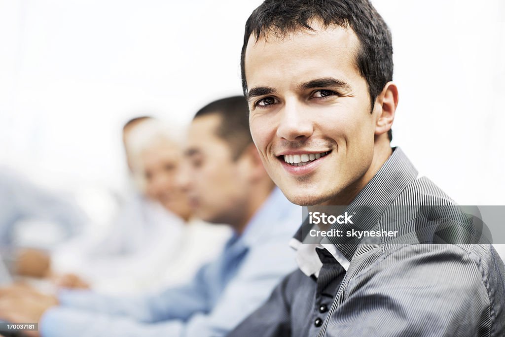 Erfolgreiche lächelnd Mann auf einer Tagung - Lizenzfrei Arbeiten Stock-Foto