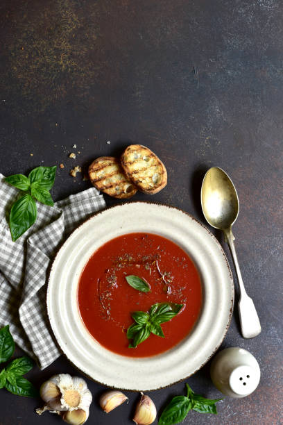 istock Spicy tomato soup or gazpacho. Top view with copy space. 1700378640