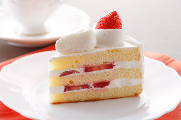 istock Delicious-looking shortcake topped with fresh strawberries 1700381907