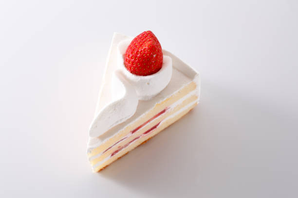 istock Delicious-looking shortcake topped with fresh strawberries 1700383632