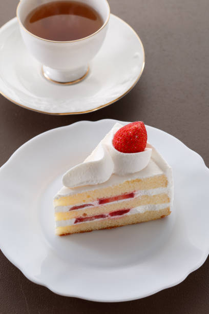 istock Delicious-looking shortcake topped with fresh strawberries 1700384179