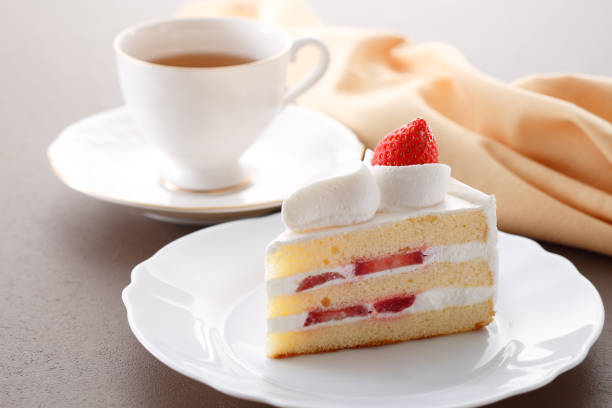 istock Delicious-looking shortcake topped with fresh strawberries 1700384751