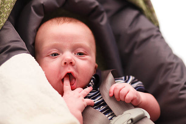 istock Playful Baby in Carseat 170039083