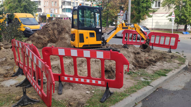 istock Road construction work in the city. 1700393029
