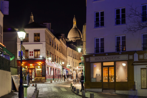 Street with shops and restaurants in Montmartre, Paris, France