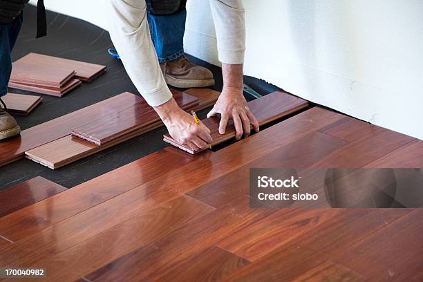 Installing Hardwood Floor Stock Photo - Download Image Now - Hardwood Floor, Flooring, Installing