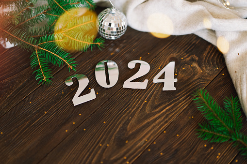 Happy New Years 2024. Christmas background with Christmas tree and Christmas decorations. Christmas holiday celebration. New Year concept.