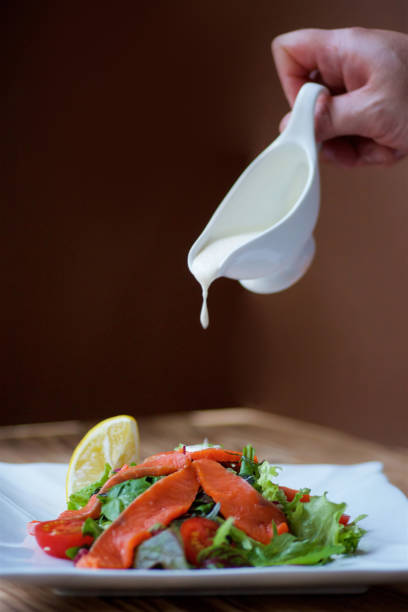 istock Salad of fish and vegetables 1700427329