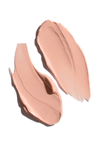 istock Cream texture cosmetic smear isolated on white background. Base for make-up. Toning cream for the skin. 1700430357