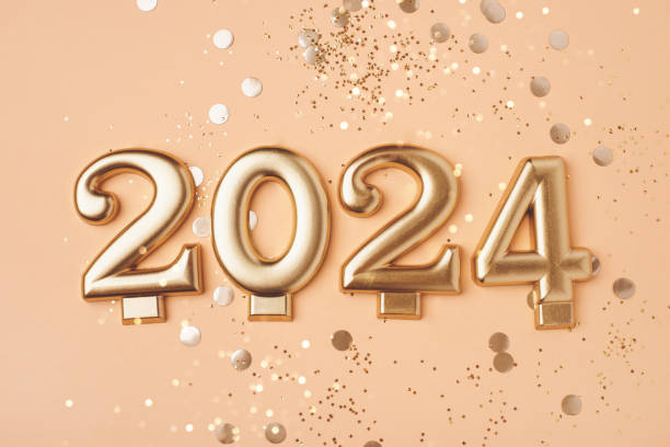 istock Golden 2024 on a peach color background. 1700434899
