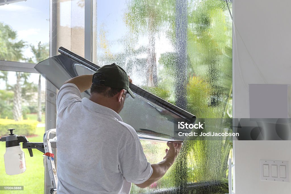 Window Tinting Window tinting in Florida where the sun makes the house very hot and fades furniture Window Stock Photo