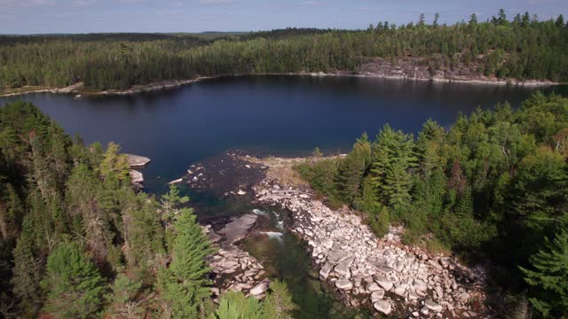 Pristine waterfalls in the Canadian wilderness, 4K aerial shot