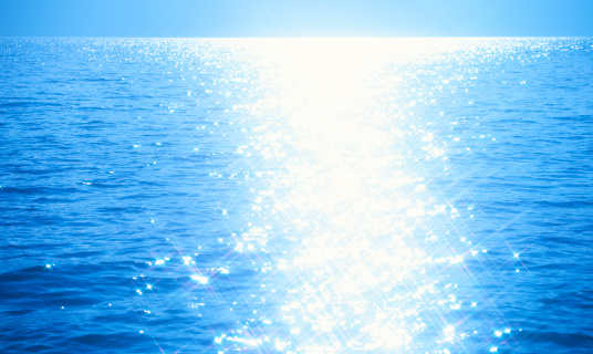 cross shape of light on the water