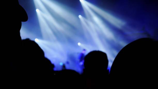 istock Anonymous Crowd Dancing in Music Club 1700472040