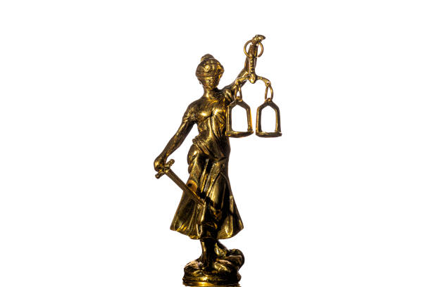 istock Lady Justice, goddess Justitia, with white background 1700475913