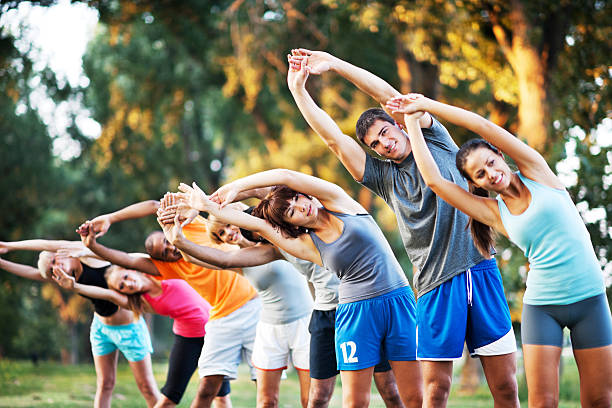 istock Group of people doing stretching exercises. 170048568