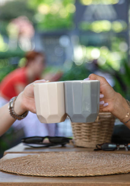 istock Woman's are drinking morning coffee at cafe shop. 1700515298