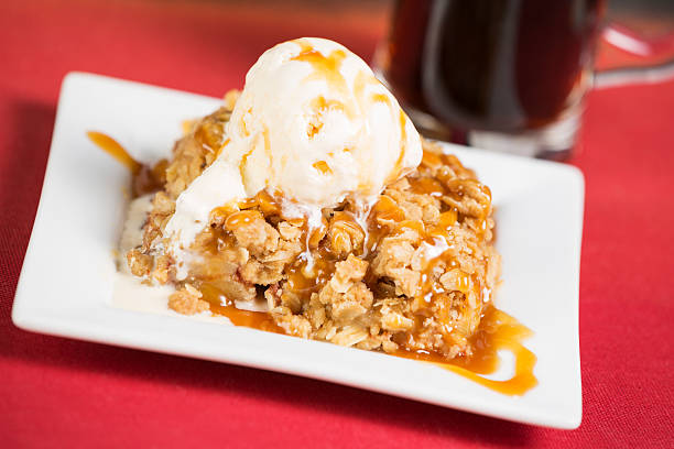 Apple crisp pie with vanila ice cream Apple crisp pie with caramel sauce and vanila ice cream. You might alos be interested in these: apple pie and ice cream stock pictures, royalty-free photos & images