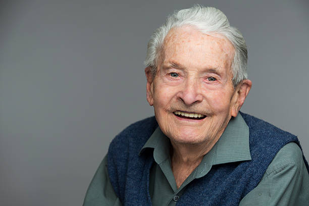 istock Headshot of a senior 90-year old man on grey 170051959