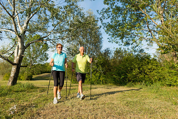 istock happy senior nordic walkers 170052346