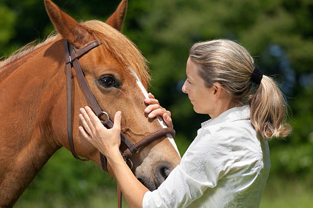 istock real friendship woman horse 170052467