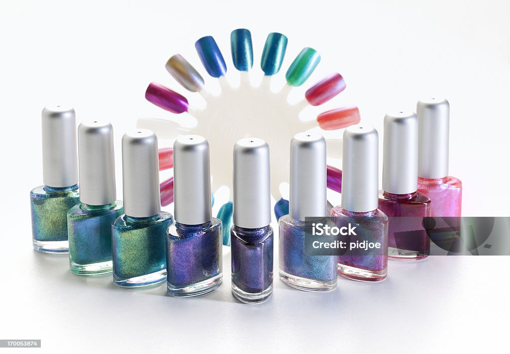 nail polish close up on bottles with colorful nail polish and color wheel with nail polish on white background, focus on the foreground, shot with tilt shift lens Fingernail Stock Photo