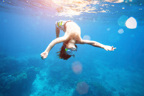 istock Young boy swimming in the sea 170054946