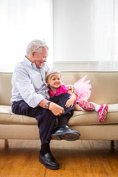 istock Grandpa and grandaughter playing princess 170055101