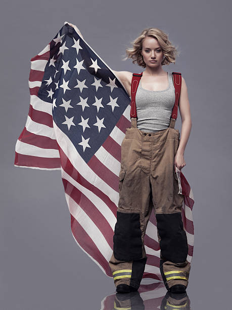 istock Female Holding An American Flag 170055311