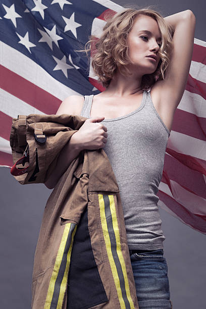 istock Female Holding An fireman trousers 170055335