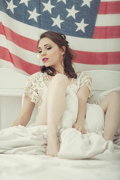 istock Female Holding An American Flag 170055336