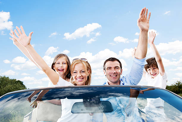 istock Happy family in convertible car. 170057285