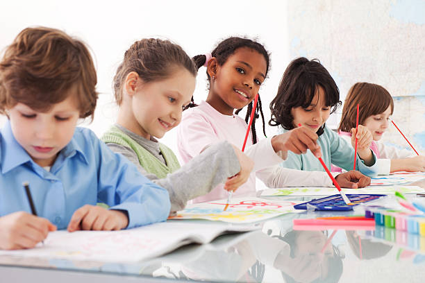 istock Children are sitting in the classroom and writing. 170057738