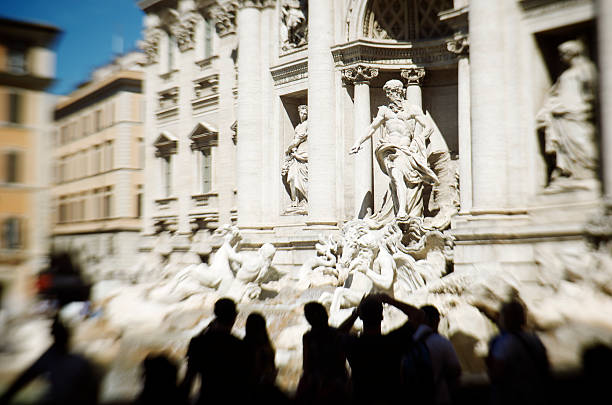 istock Trevi Fountain Rome Selective Focus Tourist Silhouettes 170058624