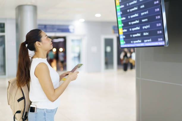 istock Female passenger walking at the airport. 1700611577