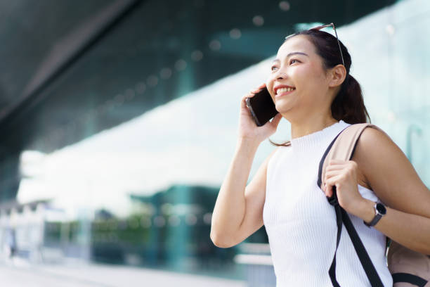 istock Female passenger walking at the airport. 1700612113