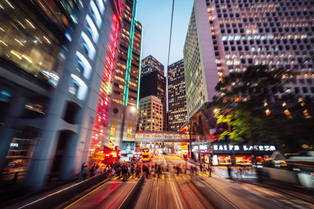 Abstract motion-blurred view from a moving tram Hongkong\ntraffic in city Hong Kong