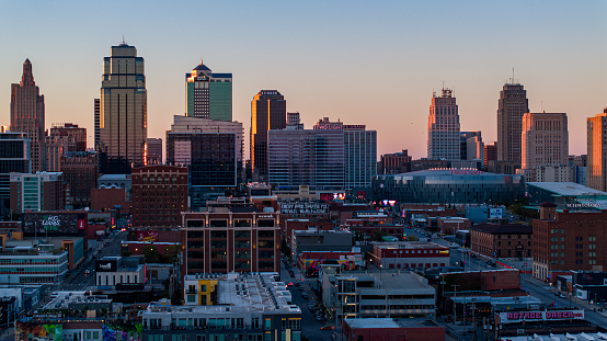 Drone shot of Downtown Kansas City skyscrapers at sunset.