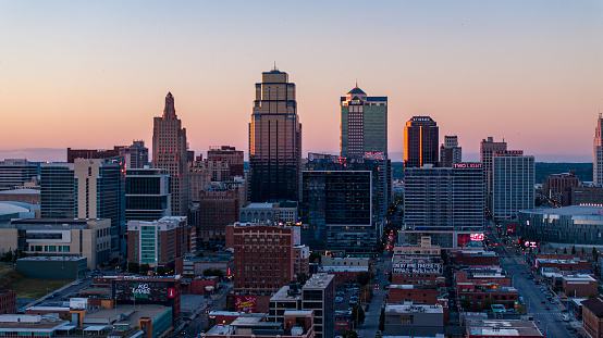 Drone shot of Downtown Kansas City skyscrapers at sunset.