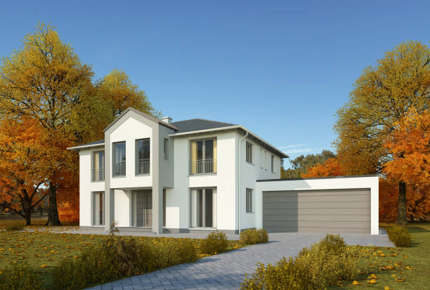 istock Modern house in a classic style with garage in autumn 1700637717