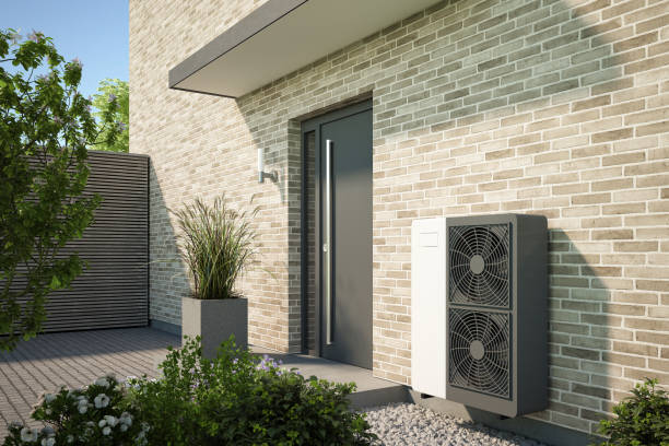 istock Modern house with air water heat pump 1700637758