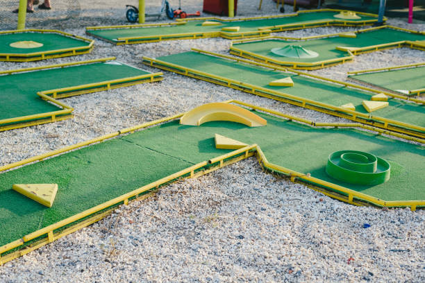 istock Labyrinth to play minigolf at a fair. 1700640470