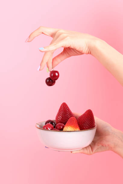 istock Woman with Fruit 1700668435